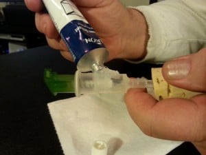 Applying silicone to a soap pump